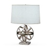 A table lamp that is a true work of art! Dark antique nickel over metal. Oyster linen shade. Three way switch.