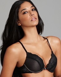 Calvin Klein's racerback bra with mesh overly cups provides a flattering shape and stylish silhouette.