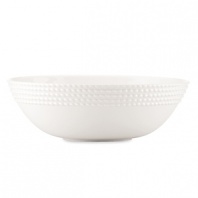 Decorated on the exterior with a twist design that's reminiscent of nautical ropes, this alluring serving bowl offers simple elegance and modern appeal for all your dinner presentations.