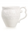 Revive the grace and charm of another era with Versailles Maison's Blanc Amelie mug. A rich pattern is entirely embossed on classic dinnerware finished with a soft white glaze and distressed detail.
