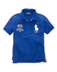 A preppy short-sleeved polo shirt in breathable cotton mesh is accented with country embroidery, celebrating Team USA's participation in the 2012 Olympics.