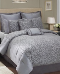 Settle in a maze of silvery style with the Plaza comforter set, featuring a sweeping grey-on-grey flourish design with cord embellishments. The neutral tones and sleek design match any room decor, and coordinating decorative pillows, European shams and bedskirt create a full, polished finish. (Clearance)