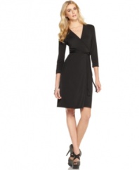 This wrap-style Studio M little black dress is a classic wardrobe staple -- punch it up with statement extas!