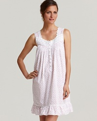 A sleeveless printed gown with lace and ruffle trim, a girlish style from Eileen West.