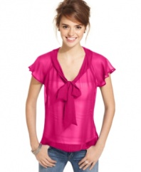 Designed in intense hues, this sheer bow blouse from Lily White adds ladylike charm to your toughest skinny jeans!