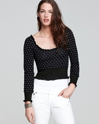 Taking its inspiration from dance-chic warmup wear, this Free People top boasts petite polka dots and a cropped silhouette.