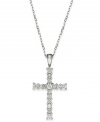 Slim and resplendent, this beautiful cross pendant features round-cut diamonds (1/4 ct. t.w.) set in 14k white gold. Approximate length: 16 inches. Approximate drop: 1 inch.