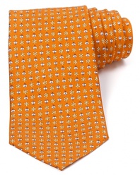 Daisies and bees flourish on this lushly colored tie from Salvatore Ferragamo, rendered in super-soft Italian silk for a lavish look and feel.