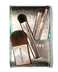 Perfectly packable in a metallic, faux-leather foldover case. Whether you're headed out of town or just a night on the town, our Mini Brush Set features full-sized brush heads atop shortened handles in a new slimline design (for a flawless finish wherever you go). Set includes four brushes: Blush, Eye Sweep, Angle Eye Shadow, and Ultra Fine Eye Liner all in a compact case. The best part? There's a handy compartment in the case designed to hold our Desert Twilight Eye Palette, too. Talk about super-organized!