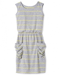 Great for the beach or the streets, this so-comfy jersey tank dress has high-voltage yellow stripes and ruched oversized pockets for an on-trend look.