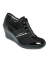 Wedge sneakers are the hottest thing on the streets. Try on The Darcy sneakers by DKNY Active and get into the trend.