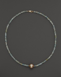 A lustrous champagne cultured freshwater pearl on a sparkling aquamarine necklace from Lara Gold for LTC.