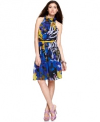 This body-skimming silhouette by M60 Miss Sixty is brightened by a vibrant floral-meets-animal print and a bold skinny belt that amplifies the look. Pick a sky-high heel to wear with this dress for maximum impact.