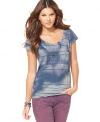 Rendered from 100% cotton, this comfy tee from DKNY Jeans is jazzed up with sequins and a faded floral graphic.