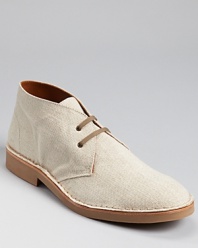 A lean chuckka from Hunter, crafted in cream linen, with a contrast rubber sole.