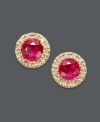 Add spark to your style with these red-hot, Effy Collection stud earrings! Brilliant rubies (7/8 ct. t.w.) create a bold background when encircled with sparkling, round-cut diamonds (1/8 ct. t.w.). Crafted in 14k gold. Approximate diameter: 1/4 inch.