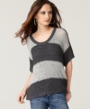 Colorblocked stripes rendered in chunky knit gives this sweater from Calvin Klein Jeans homespun cool. Layer it up with a jacket and maxi skirt, or wear it with jeans on warmer days! (Clearance)