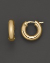 Timeless 18K yellow gold hoop earrings by Roberto Coin.
