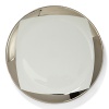 A hand-painted crescent of stunning platinum rims the edges of this thoroughly modern dinnerware collection.