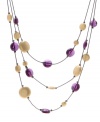 Rich purple and gold disc-shaped beads add a regal look to Kenneth Cole New York's triple-strand lightweight illusion necklace. Crafted in hematite tone mixed metal. Approximate length: 16-1/2 inches + 3-inch extender.