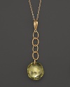Oval freeform lemon citrine briolettes add rich sparkle to links of 14K yellow gold. By Nancy B.