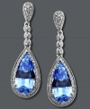 Evening elegance. Perfect your party look in Arabella's dazzling drop earrings featuring pear-cut blue Swarovski zirconias (10-5/8 ct. t.w.) edged by dozens of round-cut white zirconias (1/5 ct. t.w.). Crafted in sterling silver. Approximate length: 1-1/4 inches.