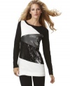Black, white and beautiful! This INC tunic sweater ups the ante with colorblocking and sequins.