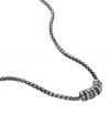 Modern design and a hint of sparkle creates a look that can be worn with anything. Fossil's effortless pendant features a rondelle center decorated with clear glass pave crystals. Crafted in silver tone mixed metal. Approximate length: 16 inches. + 2-inch extender.