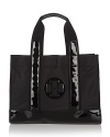 Express your Tory Burch style with this bestselling chic nylon tote.