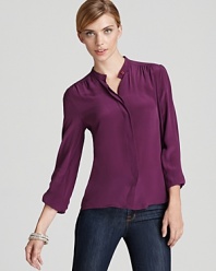 Rendered in luxe silk with gathering at the shoulders, this Tegan top updates your wardrobe with sophisticated workday style.