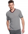 Soften your edge with the smooth style of this v-neck striped t-shirt from Sons of Intrigue.