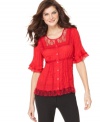 NY Collection gives us a frill! This lacy blouse looks just right for day or night.