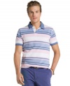 Suited for the classics. Get style that will last long beyond this season with this striped polo shirt from Izod.