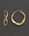 A twist on the classic hoop, these 14K. yellow gold earrings are luxe and modern.