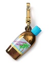 Get ready for summer with this gold plated sunscreen bottle charm from Juicy Couture. It's a total bronze medal.