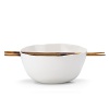 The unique shape and design of this noodle bowl demonstrates a natural elegance. With slots and holes for the chopsticks to rest, it marries an artful form with effortless function for a pure, organic expression.