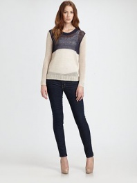Chunky, semi-sheer knit in a relaxed silhouette with ribbed trim and a modern colorblock design. Ribbed, semi-sheer crewneckDropped shouldersLong sleevesRibbed cuffs and hemSemi-sheer upper backLinen/spandexDry cleanImported of Italian fabricModel shown is 5'10 (177cm) wearing US size Small.