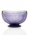Past meets present. Feminine scalloped edges and fluted detail in amethyst-hued glass make this Modern Vintage serving bowl a standout at the table and on display. From the Godinger serveware collection.