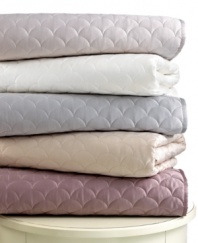 Get cozy! The Crescent Moon quilt from Barbara Barry provides an extra layer of comfort to your bed with irresistibly soft, quilted elements. A landscape of overlapping half-moon designs create an understated, elegant appearance.