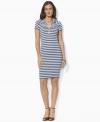 Chic rope accents and bold variegated stripes lend sophisticated nautical style to Lauren Jeans Co.'s hooded dress, constructed in ultra-soft cotton jersey for stylish comfort and versatility.