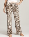 Soft knit pants featuring a chic animal print and drawstring waist.