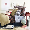 This youthful collection features elements appropriate for bedrooms, dorm rooms or first apartments. There is an irreverent feel to the printed sheeting, madras plaid quilt, khaki duvet, and many novelty accessories.
