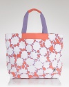 Take your penchant for prints seaside with this canvas tote from DIANE von FURSTENBERG. Sized to stow your sun bathing essentials, it's a beach babe's must.