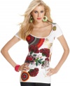 A bold floral print with beading details makes this Desigual top an outfit showstopper for summer!
