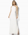 The sweeping glamour of a one-shoulder silhouette is captured in this elegant white dress from Lauren by Ralph Lauren. The matte jersey is embellished with delicate ruching and a dazzling crystal-encrusted accent.