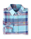 A button-down shirt in crisp woven cotton is perfectly preppy in bold-hued madras.