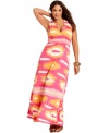 Get eye-catching style with INC's sleeveless plus size maxi dress, broadcasting a bold Ikat print.