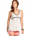 A floral print and lace trim makes this Free People tank a flirty pick for summer style!