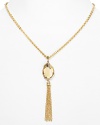 Eye-catching fringe gets a boost of elegance in this delicate pendant necklace from T Tahari. This statement piece features a faceted crystal stone, beautifully framed in gold-plated metal.