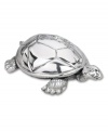 The genteel Galapagos tortoise from Reed & Barton is really a whimsical music box, playing the memorable Brahm's Lullaby. Find the wind up key on the turtle's underside. Silverplate. Think of it as a keepsake, it's warranted for 100 years!